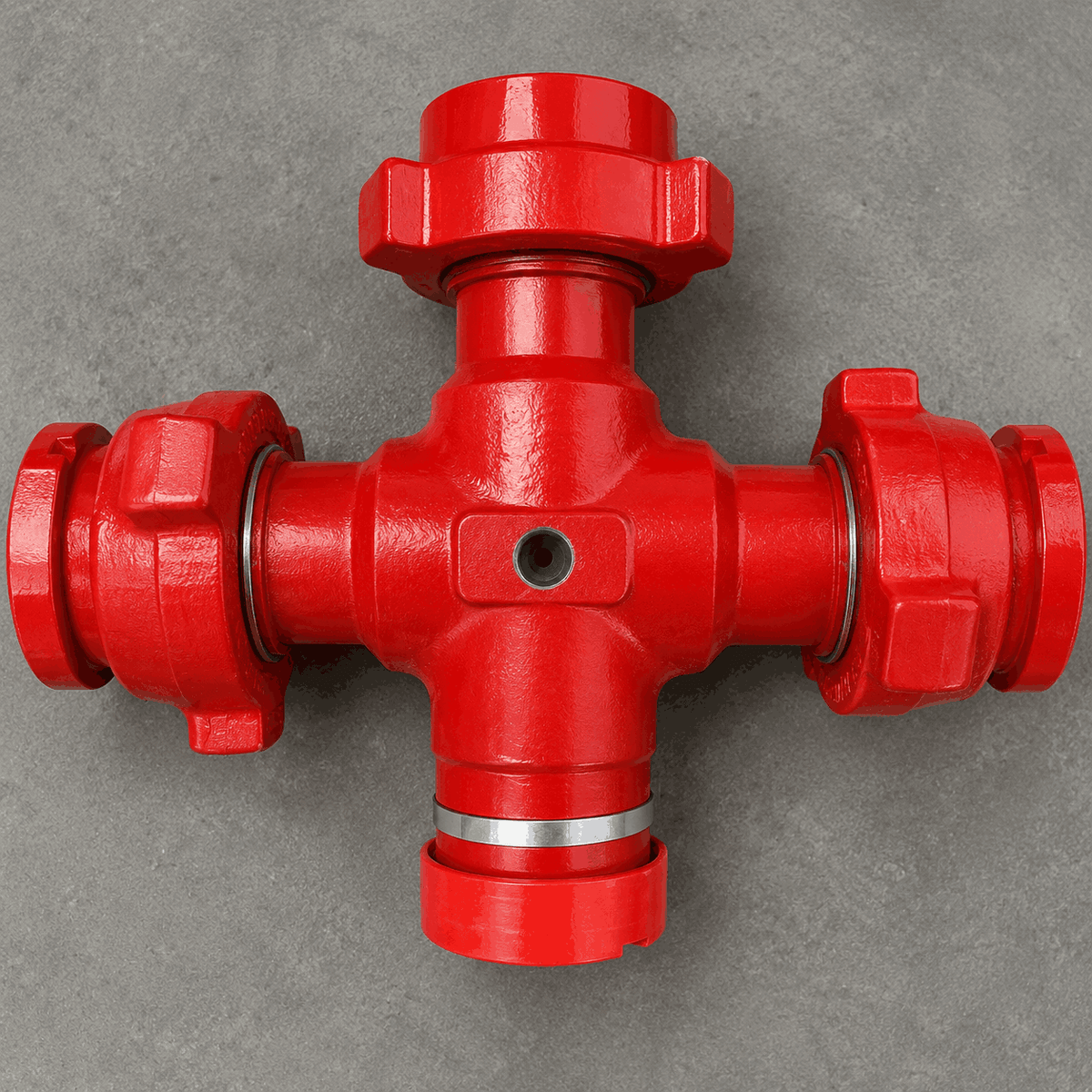 3-inch FIG 1502 flowline cross with three wing union connections, one female threaded outlet, and 9/16-inch Autoclave port for high-pressure oilfield flowline and flowback applications